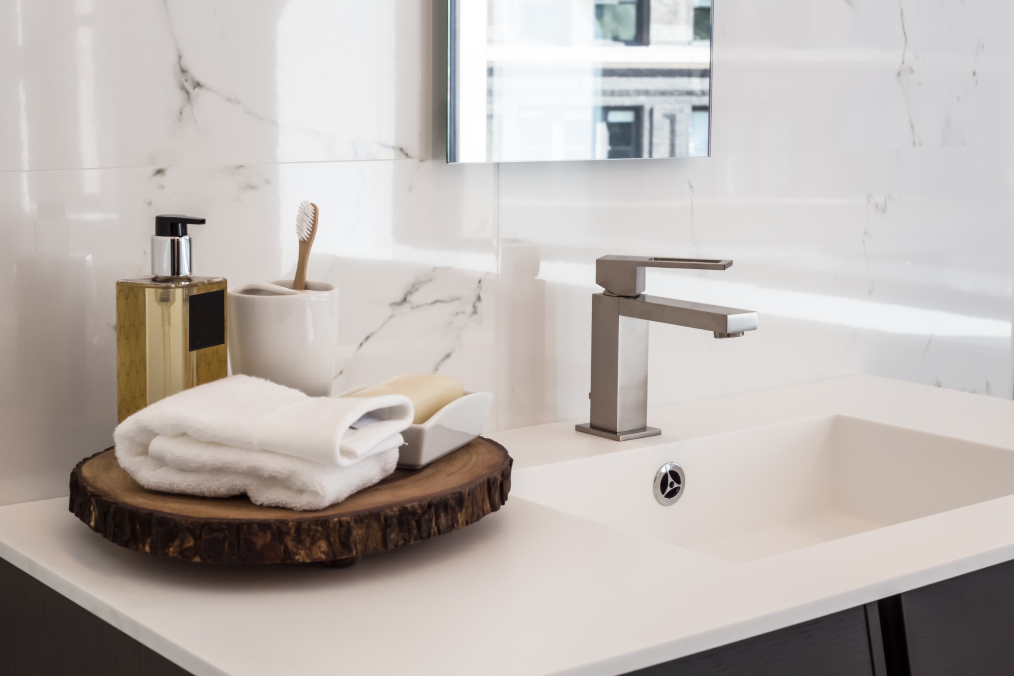 Refined bathroom amenity detail representing care-focused household support.