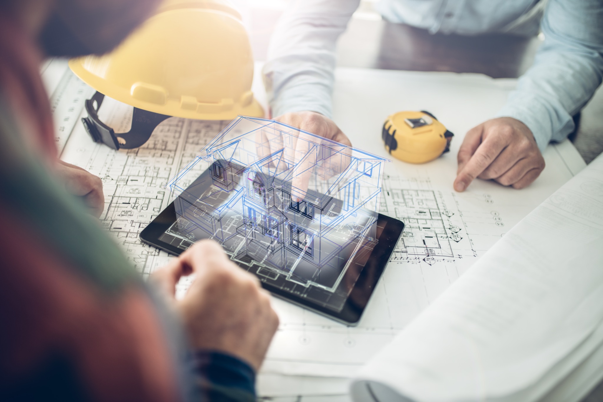 Architectural planning documents representing luxury project management.